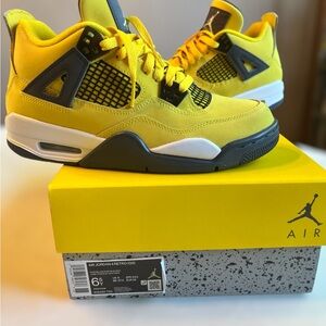 Jordan 4 lighting sneakers. Size 6.5 brand new.